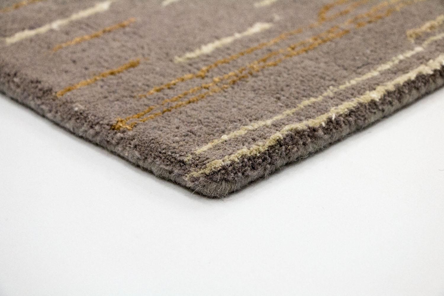 Alfombra de diseño - 242 x 151 cm - marrón