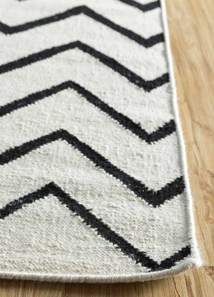 Alfombra de lana - 240 x 150 cm - blanco y negro