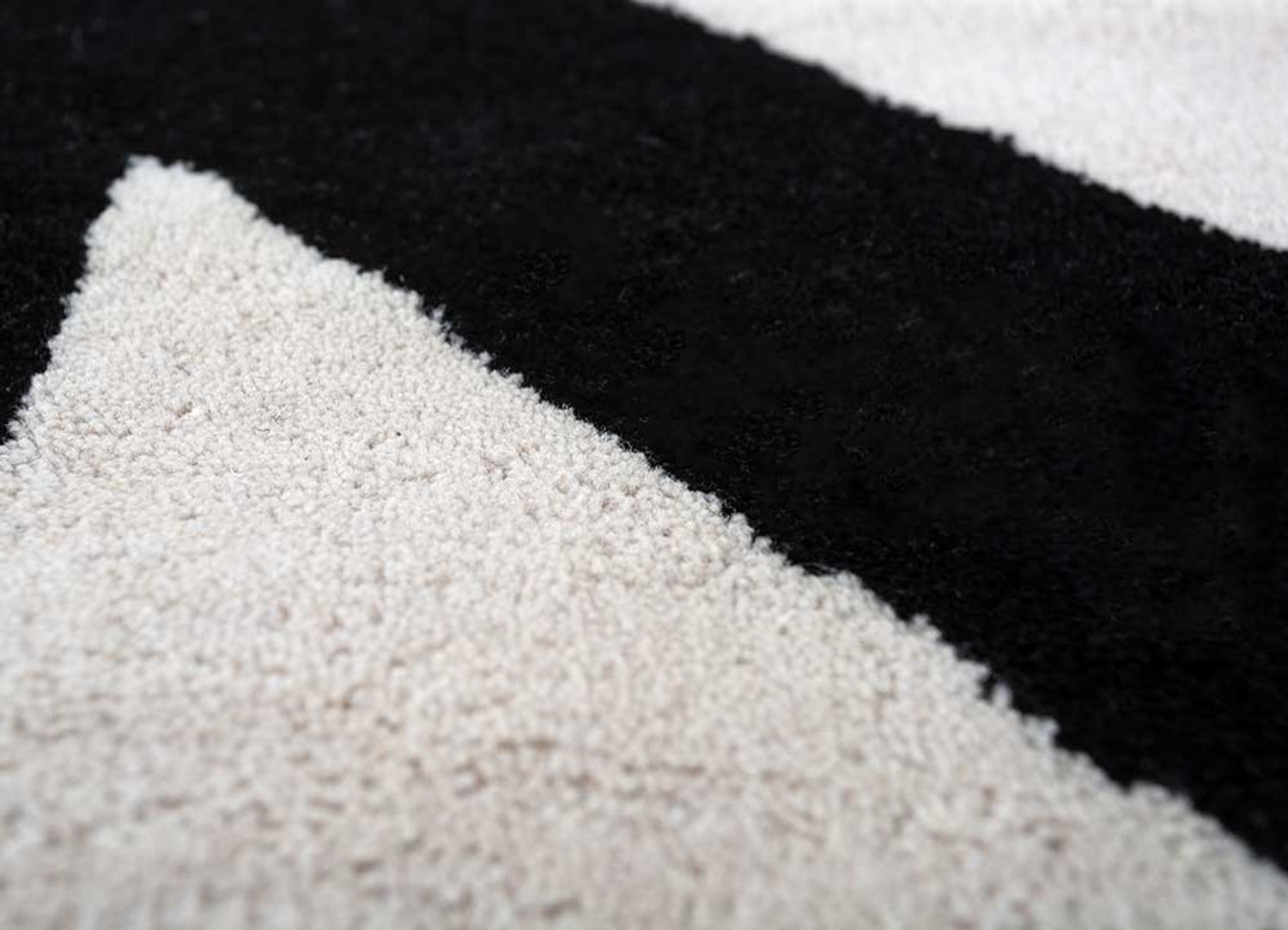 Alfombra de lana - 235 x 148 cm - blanco y negro