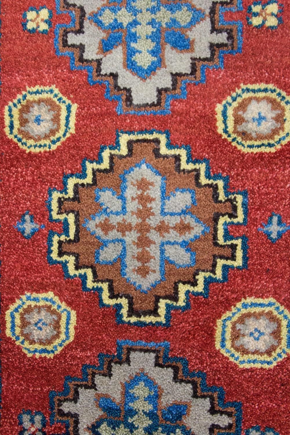 Alfombra oriental - 124 x 63 cm - rojo